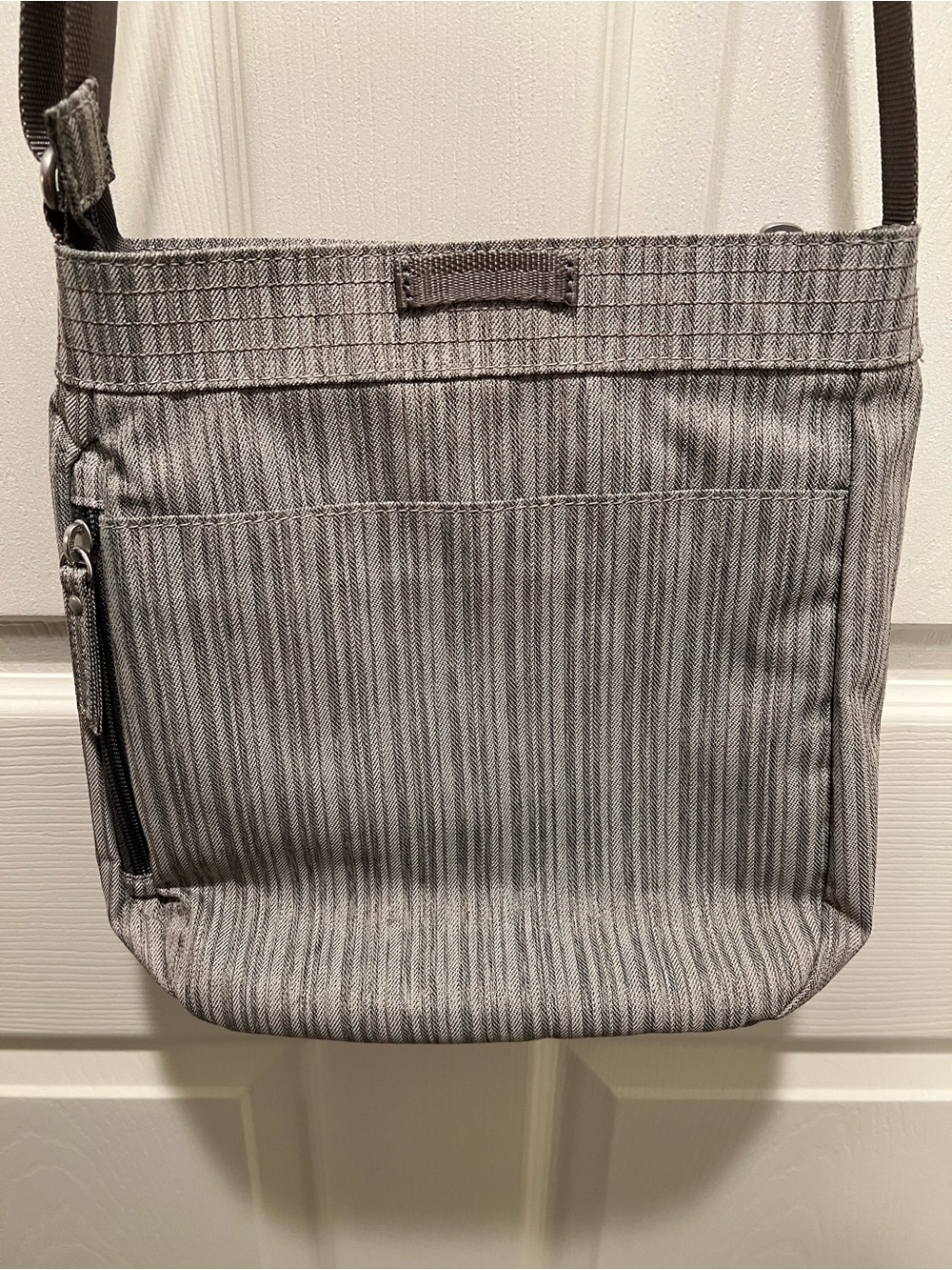 Haiku Jaunt Crossbody Purse in a Gray Striped Pattern. - Picture 8 of 10